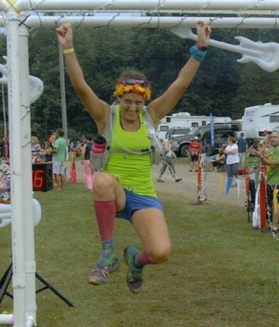 My favorite jumper pic through the Finish Line of the Run Woodstock 50 Mile Race in 2013